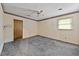 Bedroom featuring carpet, a ceiling fan, and closet at 3114 Alabama Ave, Durham, NC 27705