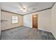 Bedroom with carpet, ceiling fan, and a closet at 3114 Alabama Ave, Durham, NC 27705