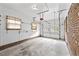 Attached garage featuring concrete flooring, white walls, and an automatic garage door at 3114 Alabama Ave, Durham, NC 27705