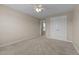 An inviting bedroom featuring plush carpeting, a ceiling fan, and double door closet at 319 Brinkley Cir, Mebane, NC 27302