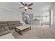 Large living room offers an open layout with views of the stairs and a modern kitchen at 319 Brinkley Cir, Mebane, NC 27302