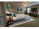 Staged primary bedroom suite with sleek furniture and art pieces, creating a welcoming space at 319 Brinkley Cir, Mebane, NC 27302