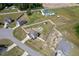 Aerial view shows a spacious, fenced backyard with a pool and shed, plus nearby playground at 328 Avery Meadows Dr, Smithfield, NC 27577