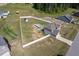 Aerial view highlights the large, fenced backyard with an above-ground pool and storage shed at 328 Avery Meadows Dr, Smithfield, NC 27577