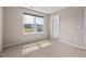 Cozy bedroom featuring a window view, carpeted floors, and soft, neutral paint at 328 Avery Meadows Dr, Smithfield, NC 27577