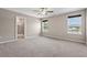 Spacious bedroom with natural light, and an en suite bathroom with a glass-enclosed shower at 328 Avery Meadows Dr, Smithfield, NC 27577