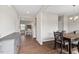 Spacious dining room with hardwood floors, stylish furniture, and neutral wall color scheme at 328 Avery Meadows Dr, Smithfield, NC 27577