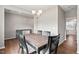Inviting dining room with stylish hardwood floors and view to the kitchen area at 328 Avery Meadows Dr, Smithfield, NC 27577