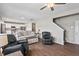 Open-concept living area boasts a fireplace, comfortable seating, and access to the kitchen at 328 Avery Meadows Dr, Smithfield, NC 27577