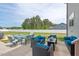 Lovely outdoor patio with a dining set, lounge seating, and an open yard, ideal for gatherings at 328 Avery Meadows Dr, Smithfield, NC 27577