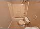 Compact bathroom featuring a bathtub and toilet at 3559 Mill Run, Raleigh, NC 27612