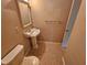 Bathroom with pedestal sink and tiled floors at 3559 Mill Run, Raleigh, NC 27612