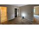 View of a bedroom with an adjoining bathroom and a closet at 3559 Mill Run, Raleigh, NC 27612