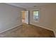 Bedroom with neutral tones and window at 3559 Mill Run, Raleigh, NC 27612
