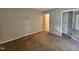 A cozy bedroom features neutral walls, doorway, closet, and carpeted floors at 3559 Mill Run, Raleigh, NC 27612