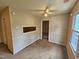 Spacious living room with neutral walls and classic ceiling fan at 3559 Mill Run, Raleigh, NC 27612