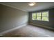 Comfortable bedroom offering natural light and neutral paint, creating a relaxing atmosphere at 3632 Rail Overlook Dr, New Hill, NC 27562