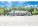 Community clubhouse with ample parking, offering a great space for gatherings and amenities at 3632 Rail Overlook Dr, New Hill, NC 27562
