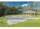 Outdoor volleyball court with sand and a covered picnic area is a great amenity for exercise and relaxation at 3632 Rail Overlook Dr, New Hill, NC 27562