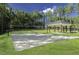 Outdoor volleyball court with sand and a covered picnic area is a great amenity for exercise and relaxation at 3632 Rail Overlook Dr, New Hill, NC 27562