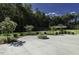 Outdoor volleyball court with sand and a covered picnic area plus a beautiful firepit enhance outdoor social opportunities at 3632 Rail Overlook Dr, New Hill, NC 27562