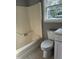 Bathroom featuring a tub and toilet at 3825 Old Coach Rd, Raleigh, NC 27616