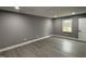 Bedroom with gray walls, recessed lighting, and durable vinyl flooring at 3825 Old Coach Rd, Raleigh, NC 27616
