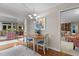 Cozy dining area with a table and chairs, leading to the living room and den at 3919 Wentworth Dr, Durham, NC 27707