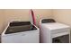 Laundry room with modern washer and dryer at 4234 Offshore Dr, Raleigh, NC 27610