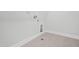 The laundry room is equipped with connections for washer and dryer hookups and tiled flooring at 425 Edison Rail Ln, Knightdale, NC 27545