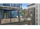Balconies with contemporary railings on a modern building with outdoor seating and city views at 515 N Mangum St # 41, Durham, NC 27701