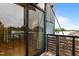 View from balcony provides sight of the floor, metal railings, and partially visible glass window at 515 N Mangum St # 41, Durham, NC 27701
