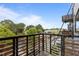 A view of the balcony looking over the neighborhood and trees is a relaxing sight to see at 515 N Mangum St # 41, Durham, NC 27701
