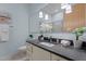 Modern bathroom with a large mirror and stylish vanity at 515 N Mangum St # 41, Durham, NC 27701