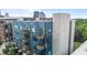 Modern blue and white building with balconies, offering stunning views of the city skyline at 515 N Mangum St # 41, Durham, NC 27701