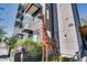 Contemporary building with a metal giraffe sculpture in front and modern architectural elements at 515 N Mangum St # 41, Durham, NC 27701