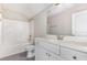 Clean bathroom features a tub/shower combination, toilet, and vanity with mirror and ample storage at 57 S Shreve Dr, Wendell, NC 27591