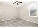 Bedroom featuring neutral walls, carpeted floors, a ceiling fan, and a window at 57 S Shreve Dr, Wendell, NC 27591