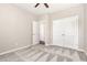 Cozy bedroom features neutral walls, plush carpeting, and ample closet space at 57 S Shreve Dr, Wendell, NC 27591