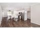 Modern kitchen with white cabinetry, stainless steel appliances, and a center island at 57 S Shreve Dr, Wendell, NC 27591