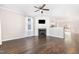 Bright living room with a fireplace, hardwood floors, and ample natural light at 57 S Shreve Dr, Wendell, NC 27591