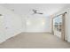 Light-filled bedroom featuring plush neutral carpet, ceiling fan, and recessed lighting at 59 Tobacco Farm Way, Chapel Hill, NC 27516