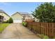 Beautiful home with a long driveway, a two car garage, solar panels and fenced yard; great for families at 59 Tobacco Farm Way, Chapel Hill, NC 27516