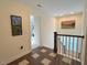 Upstairs hallway with painting and natural light at 59 Tobacco Farm Way, Chapel Hill, NC 27516
