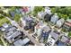 An aerial view of modern homes with rooftop decks, showing the neighborhood's layout and green spaces at 606 Velma Hopkins Ln, Raleigh, NC 27603