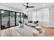 Bright living room with a sliding glass door that allows easy access to the backyard at 606 Velma Hopkins Ln, Raleigh, NC 27603