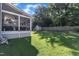 Fenced backyard with a shed and a covered back porch at 609 Redford Place Dr, Rolesville, NC 27571