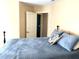 Comfortable bedroom with a well-made bed and convenient access to an adjacent room for added living space at 609 Redford Place Dr, Rolesville, NC 27571