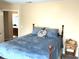 Comfortable bedroom with a well-made bed and convenient access to an adjacent bathroom for added privacy at 609 Redford Place Dr, Rolesville, NC 27571