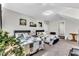 Bedroom featuring two beds with quilt bedding, neutral walls and carpet at 609 Redford Place Dr, Rolesville, NC 27571